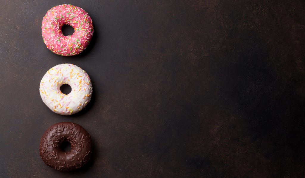 three colorful donuts