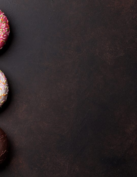 three colorful donuts